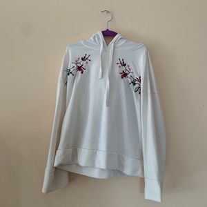 White top with embroidered flowers
